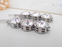 Swsrovski Wedding Day dangle Earrings in a filigree platinum setting