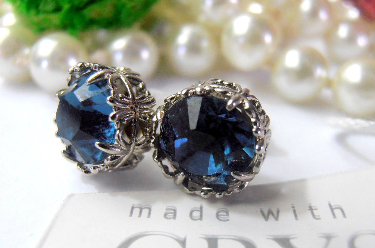 Swarovski Montana Crystal Earrings in a platinum filigree prong setting, Swarovski rhinestone studs