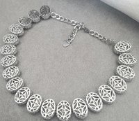 Platinum Filligree Necklace with hyacinth crystals, photo shows the back of the oval filigree prong setting of the necklace
