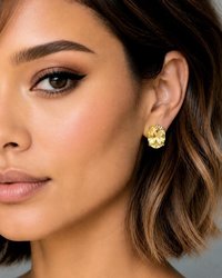 Elegant citrine crystal stud earrings worn on ear with natural makeup and soft everyday styling.