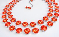 Fiery orange 12mm Swarovski Rivoli crystal bracelet in a silver plated cupchain setting