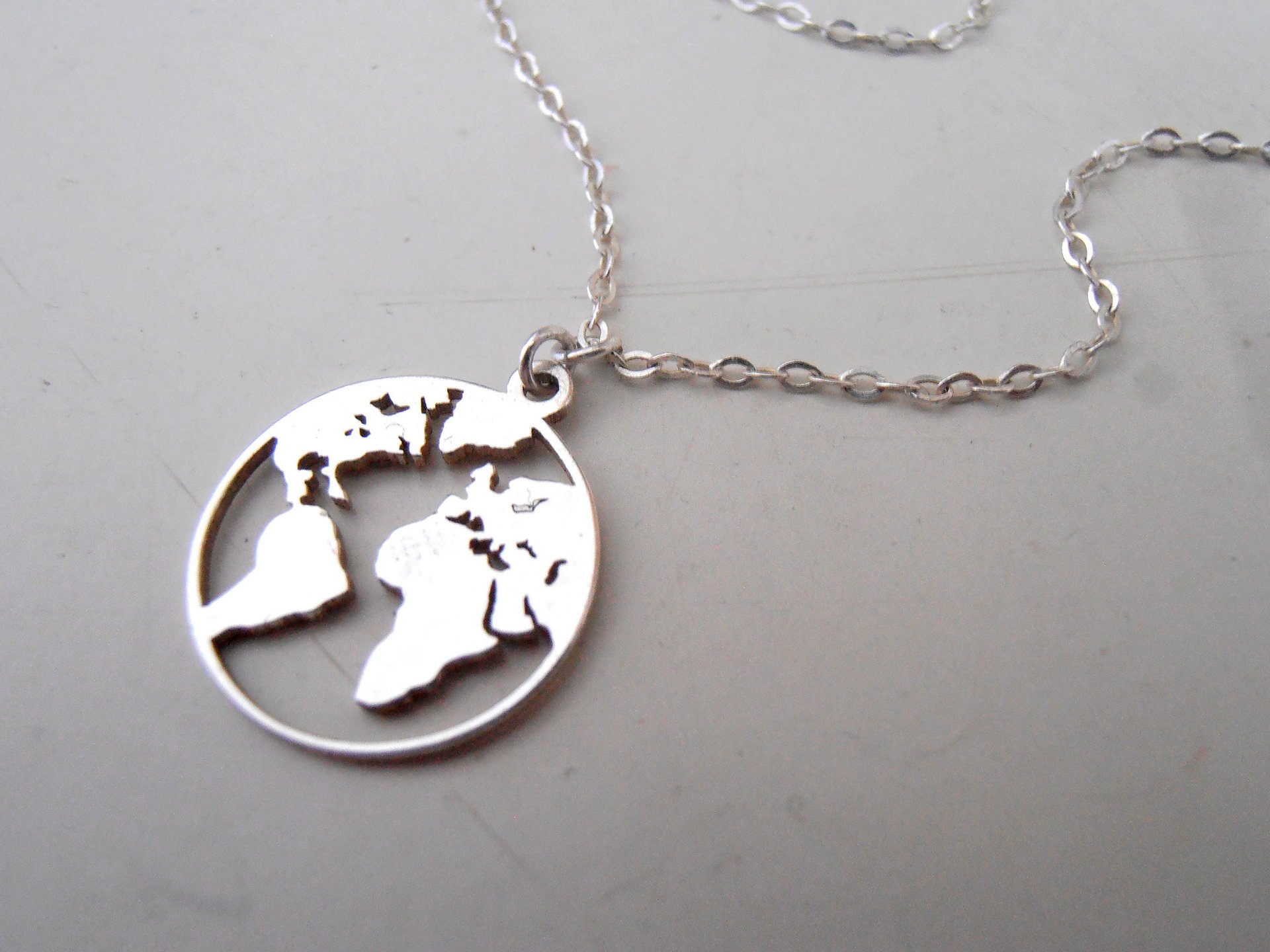 World Map Necklace / Sterling Silver Earth Pendant / Weltkarte Halskette / wanderlust jewelry / Laser Cut Globe / Pendentif Carte Monde