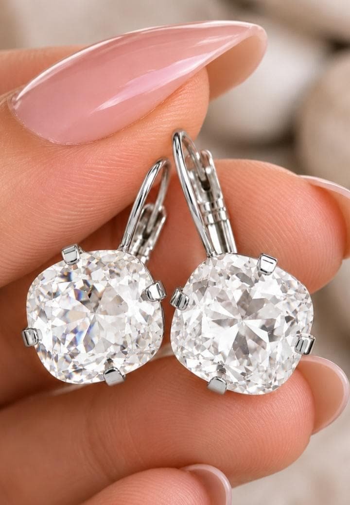 Vintage style Swarovski crystal drop earrings with 12mm clear cushion cut crystals in silver plated leverback settings.