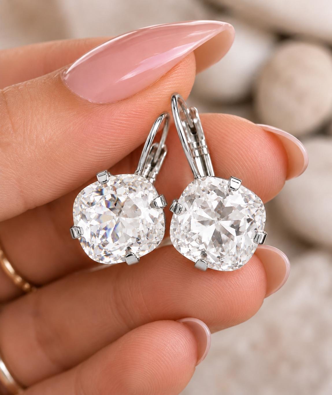 Classic vintage-inspired Swarovski crystal bridal earrings with sparkling 12mm clear cushion cut crystals and secure leverback hooks.