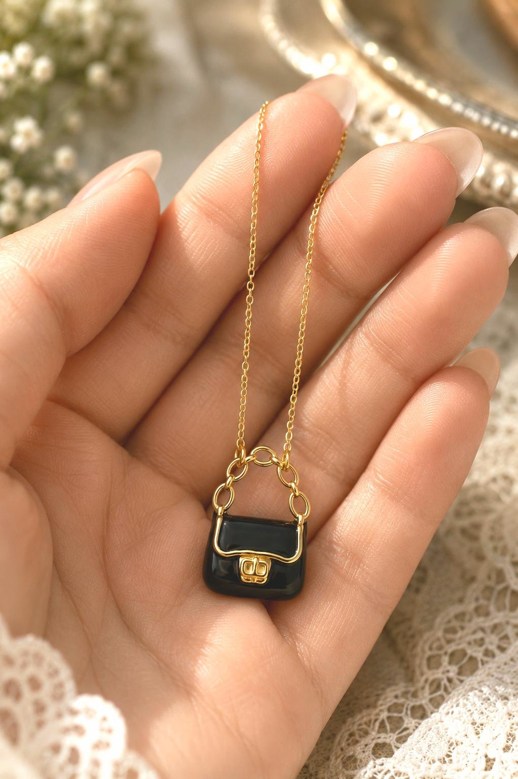 Fashion gift necklace featuring a miniature purse charm.