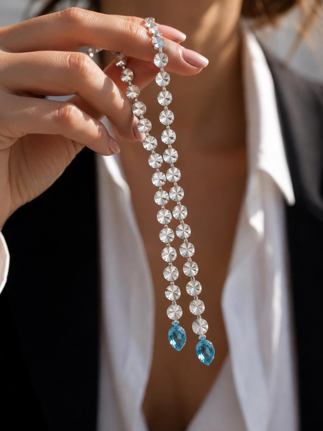 Long clear 12mm Swarovski Rivoli crystal Y necklace in silver plated with double hanging crystal strands.